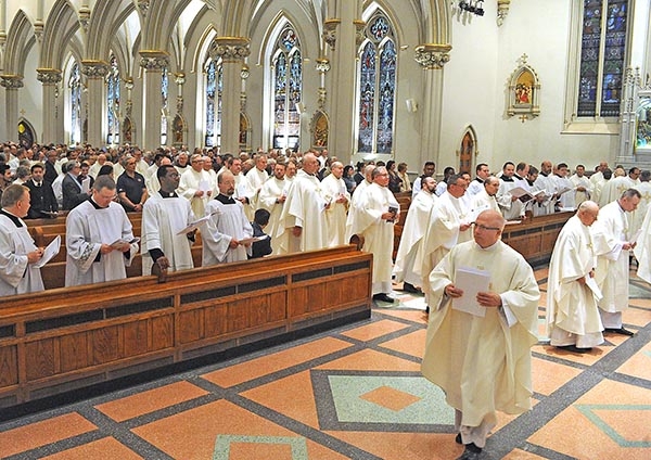 Bishop Richard Malone blesses the gifts at St. Joseph Cathedral during the annual Chrism Mass. (Dan Cappellazzo/Staff Photographer)